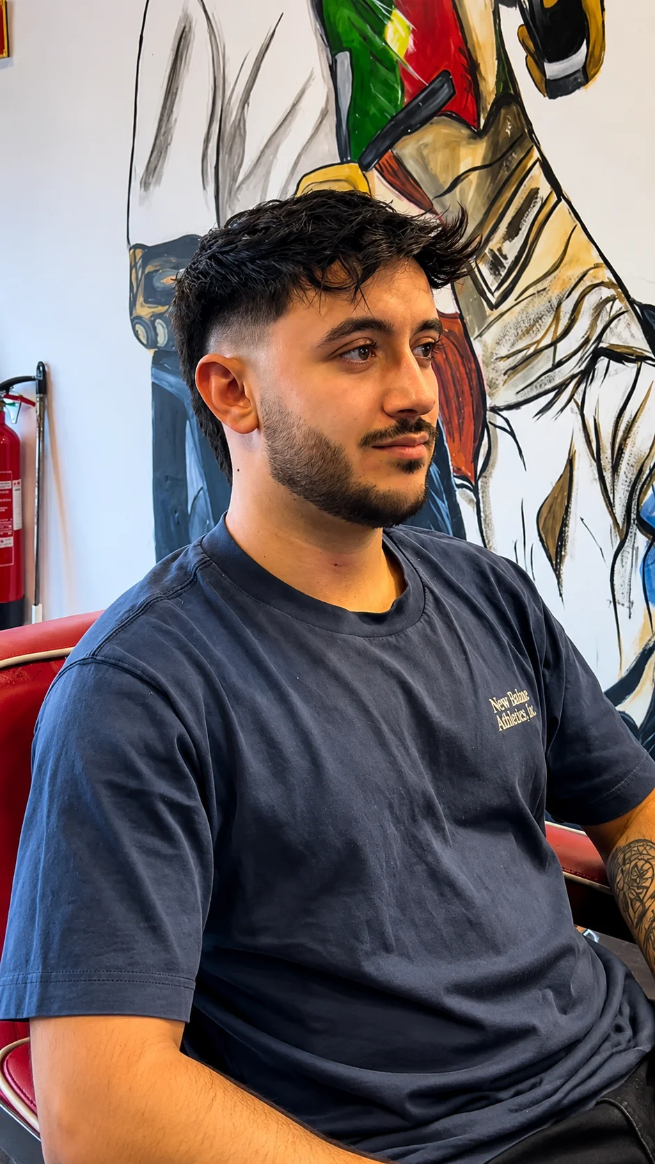 Skin fade com barba alinhada